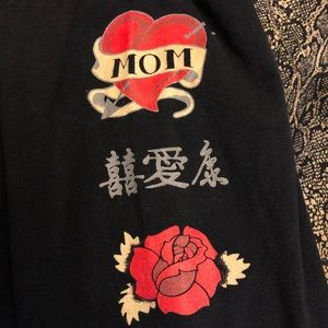 Moon Song maternity black tee with “Mom” tattoo